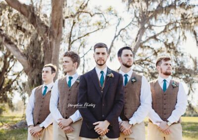 Love this portrait of this groom and groomsmen in winter. Image by Umphie Photos.