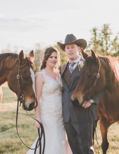 This bride and groom brought their horses to the ranch so they could have portraits made with them after the ceremony. Image by www.maudielucasphotography.com.