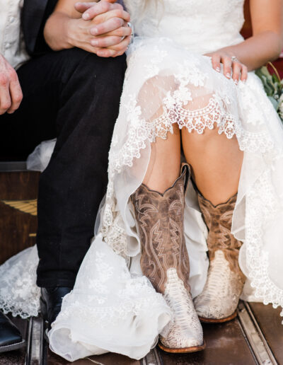 C Bar Ranch brides wear everything from glittery stilletos and bespangled tennies, to cowboy boots with glam detailing, like these shot by AmberDornPhotography.com.
