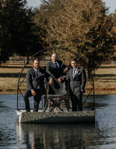 A C Bar Ranch groom and his groomsmen arrive at the ceremony site in an airboat.
