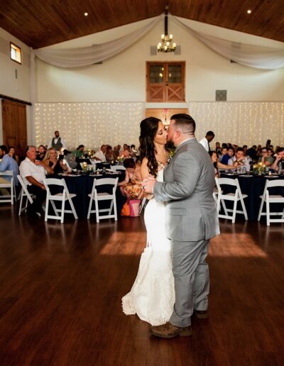 Bride and groom during their first dance at their wedding reception at C Bar Ranch.